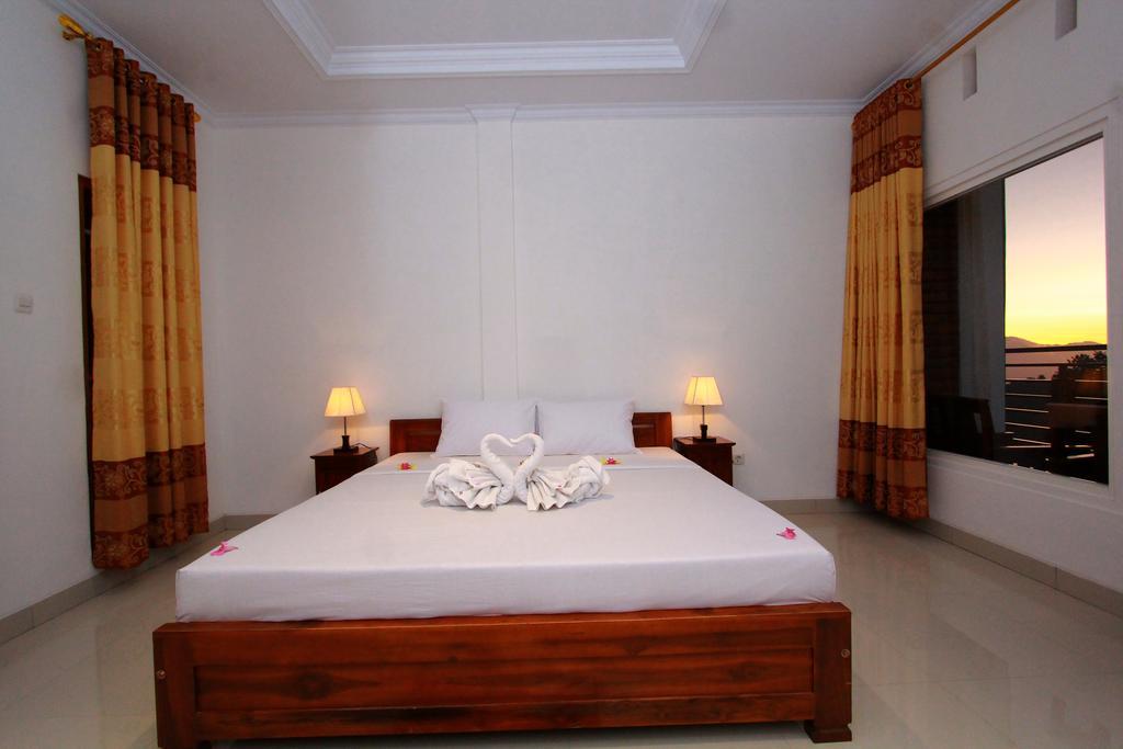 Готель Bali Bening Мундук Екстер'єр фото